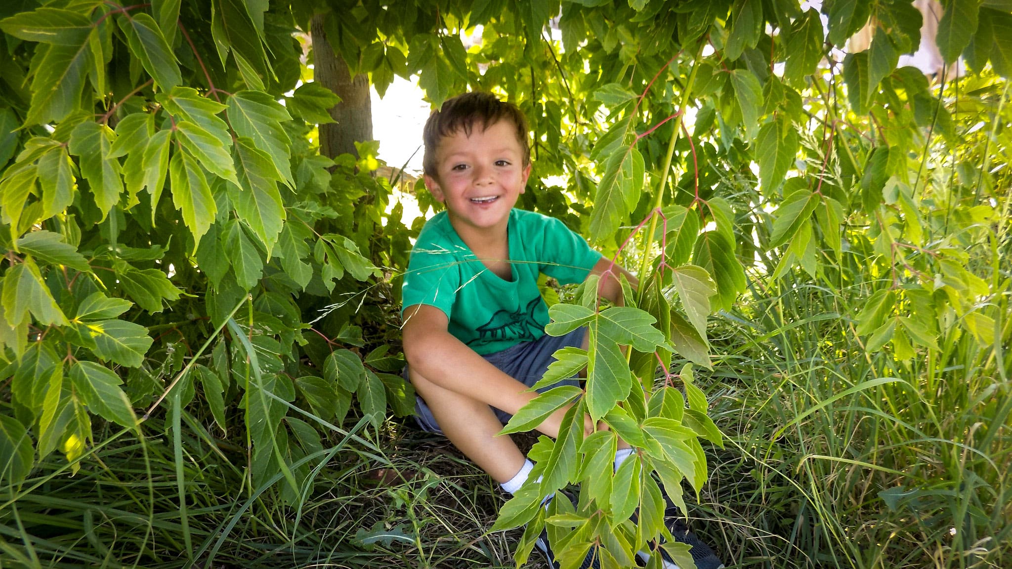 A SPREE field trip student shows the animal habitat that they found along the South Platte River.