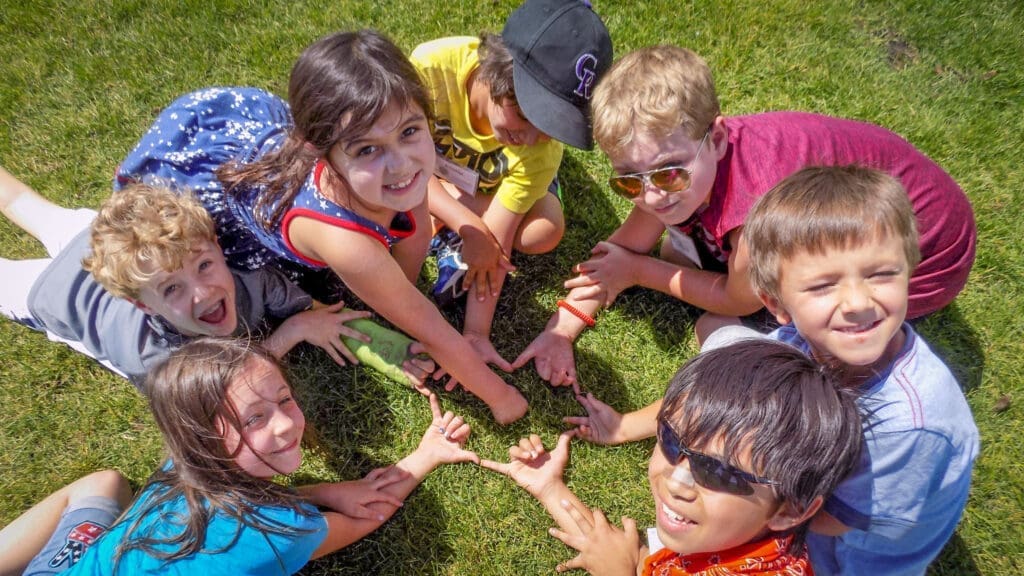 SPREE LIT Camper leads a group activity with younger campers.