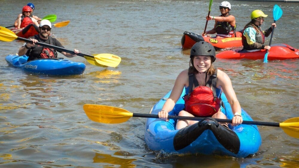 Kayakers on the Cherry Creek at The Greenway Foundation's Crosscurrents Event