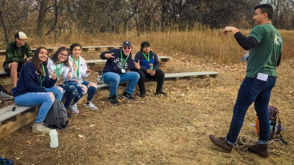 Greenway Leadership Corps members listen to a presentation on environmental stewardship.
